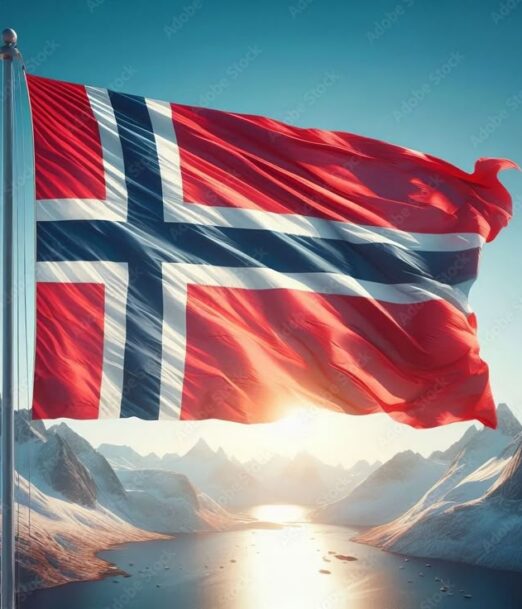 Norwegian flag waving proudly at sunrise over dramatic mountains reflecting in tranquil waters_ Norwegian fjord Stock Photo _ Adobe Stock